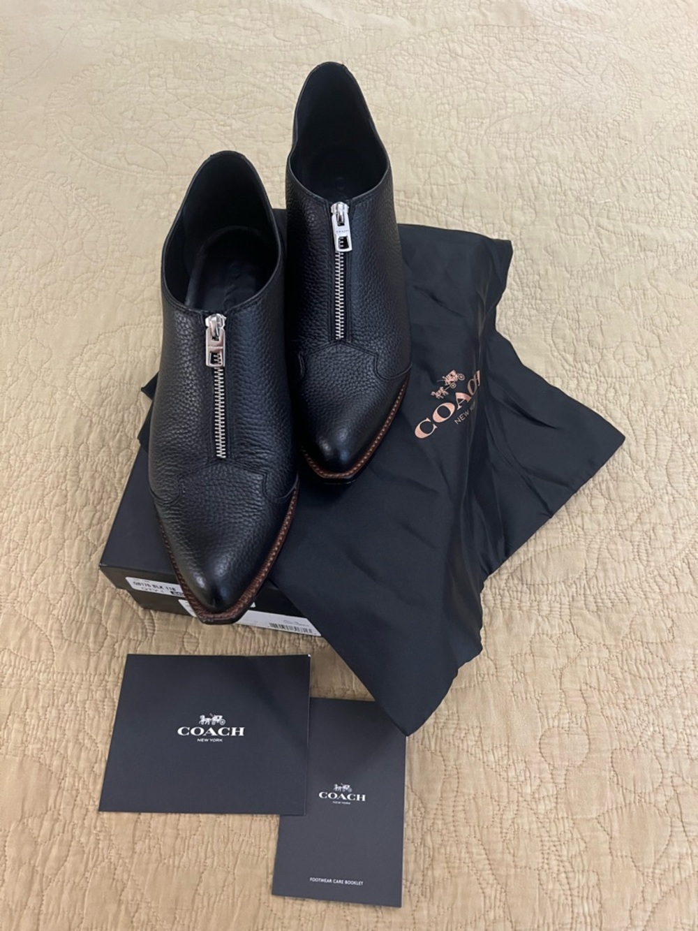 Coach womens cowboy Black booties in Pebbled Leather Front-Zip worn only 1 time